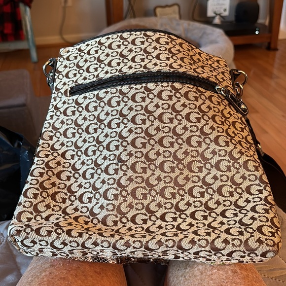 Unnamed brown cross body. Assorted colors and fabric make up both outside purse - Picture 3 of 4